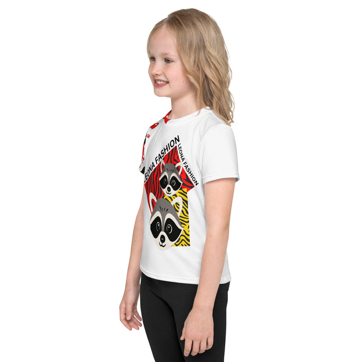 Raccoon Bandit Glow Girls T-shirt, white background with two gray raccoons inside red and yellow rectangular patterns with black stripes, red and black splash detail on right sleeve and neckline, left side view on model-with a visible 'Leona Fashion' text on the design