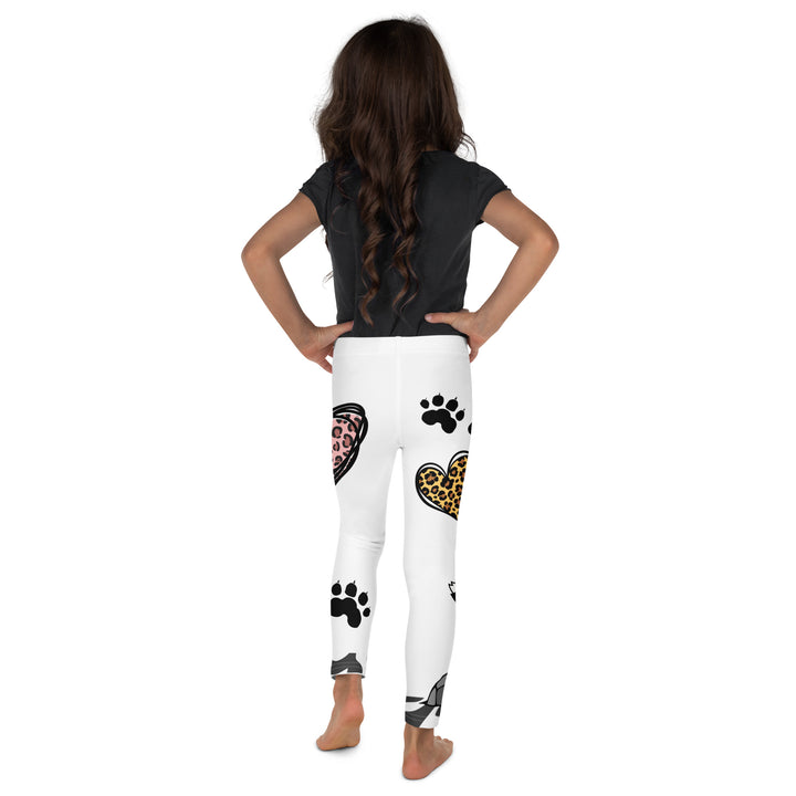Raccoon Love Girls Leggings, white background with gray raccoon blowing a pink bubble gum sitting on a rock, pink tiger-striped heart, claws, and animal paw details, back view on model