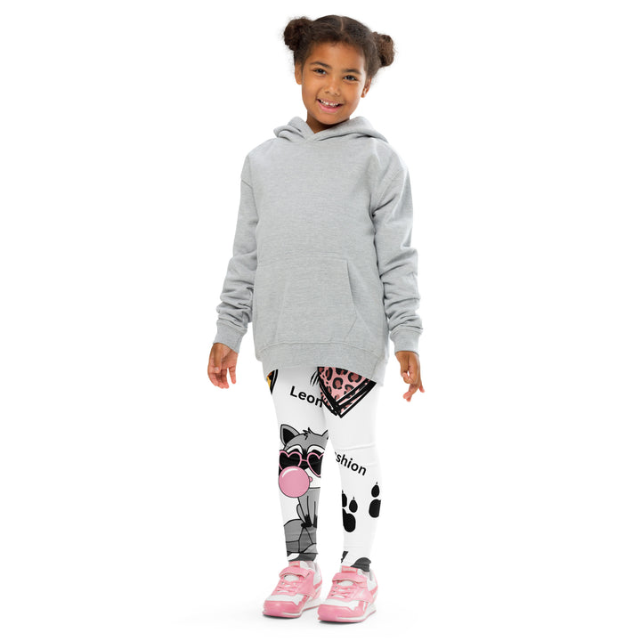 Raccoon Love Girls Leggings, white background with gray raccoon blowing a pink bubble gum sitting on a rock, pink tiger-striped heart, claws, and animal paw details, front pose with arms extended on model-with a visible 'Leona Fashion' text on the design