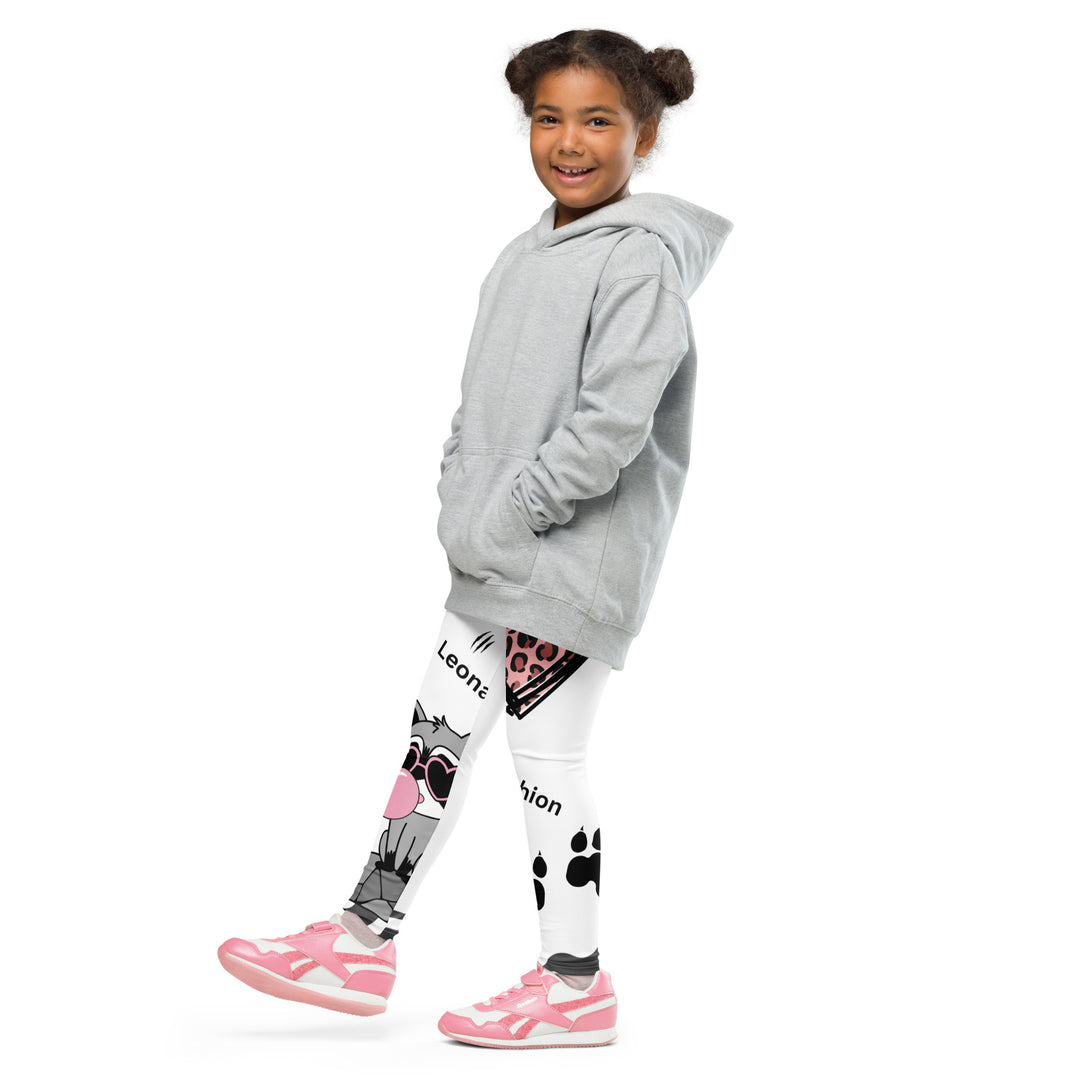Raccoon Love Girls Leggings, white background with gray raccoon blowing a pink bubble gum sitting on a rock, pink tiger-striped heart, claws, and animal paw details, front view with one leg lifted and extended on model-with a visible 'Leona Fashion' text on the design
