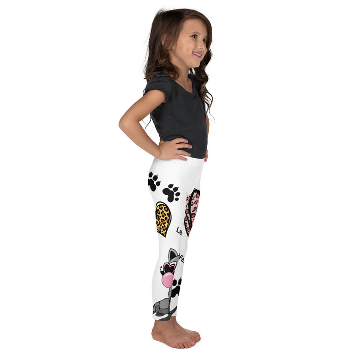  Raccoon Love Girls Leggings, white background with gray raccoon blowing a pink bubble gum sitting on a rock, pink tiger-striped heart, claws, and animal paw details, right side view on model