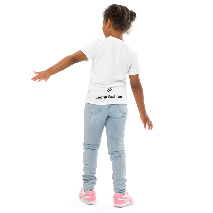  Raccoon Love Girls T-shirt – back angle with relaxed pose on model, white with gray raccoon standing on a rock blowing a pink bubble gum, wearing pink heart-shaped sunglasses, surrounded by pink tiger-striped hearts-with a visible 'Leona Fashion' text on the design