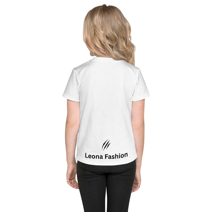 Raccoon Love Girls T-shirt – back view on model, white with gray raccoon standing on a rock blowing a pink bubble gum, wearing pink heart-shaped sunglasses, surrounded by pink tiger-striped hearts-with a visible 'Leona Fashion' text on the design