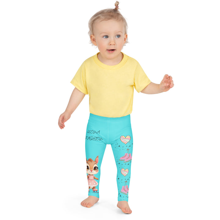 Skate Squirrel Girls Leggings, pastel blue background with a squirrel wearing a pink dress and ice skates on one leg, pastel pink and blue hearts with pink skates on the other leg, and black sparkling star details winding between the elements, front close-up view on model-with a visible 'Leona Fashion' text on the design