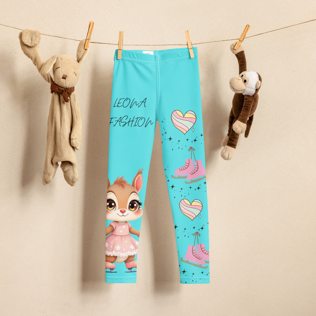 Skate Squirrel Girls Leggings, pastel blue background with a squirrel wearing a pink dress and ice skates on one leg, pastel pink and blue hearts with pink skates on the other leg, and black sparkling star details winding between the elements, front view on hanger-with a visible 'Leona Fashion' text on the design