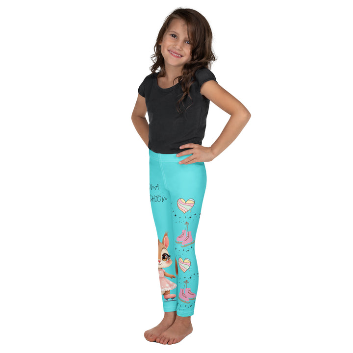 Skate Squirrel Girls Leggings, pastel blue background with a squirrel wearing a pink dress and ice skates on one leg, pastel pink and blue hearts with pink skates on the other leg, and black sparkling star details winding between the elements, left side view on model