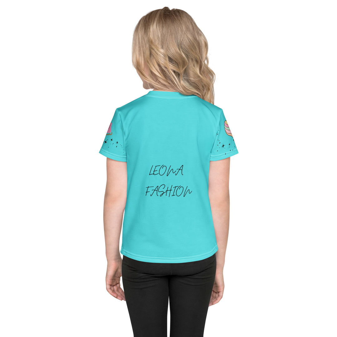 Skate Squirrel Girls T-shirt, pastel blue background with a squirrel wearing pink leggings and ice skates on the front, pink skates with small sparkling black stars on the left sleeve, and a pastel pink and blue heart with tiny sparkling black stars on the right sleeve, back view on model-with a visible 'Leona Fashion' text on the design