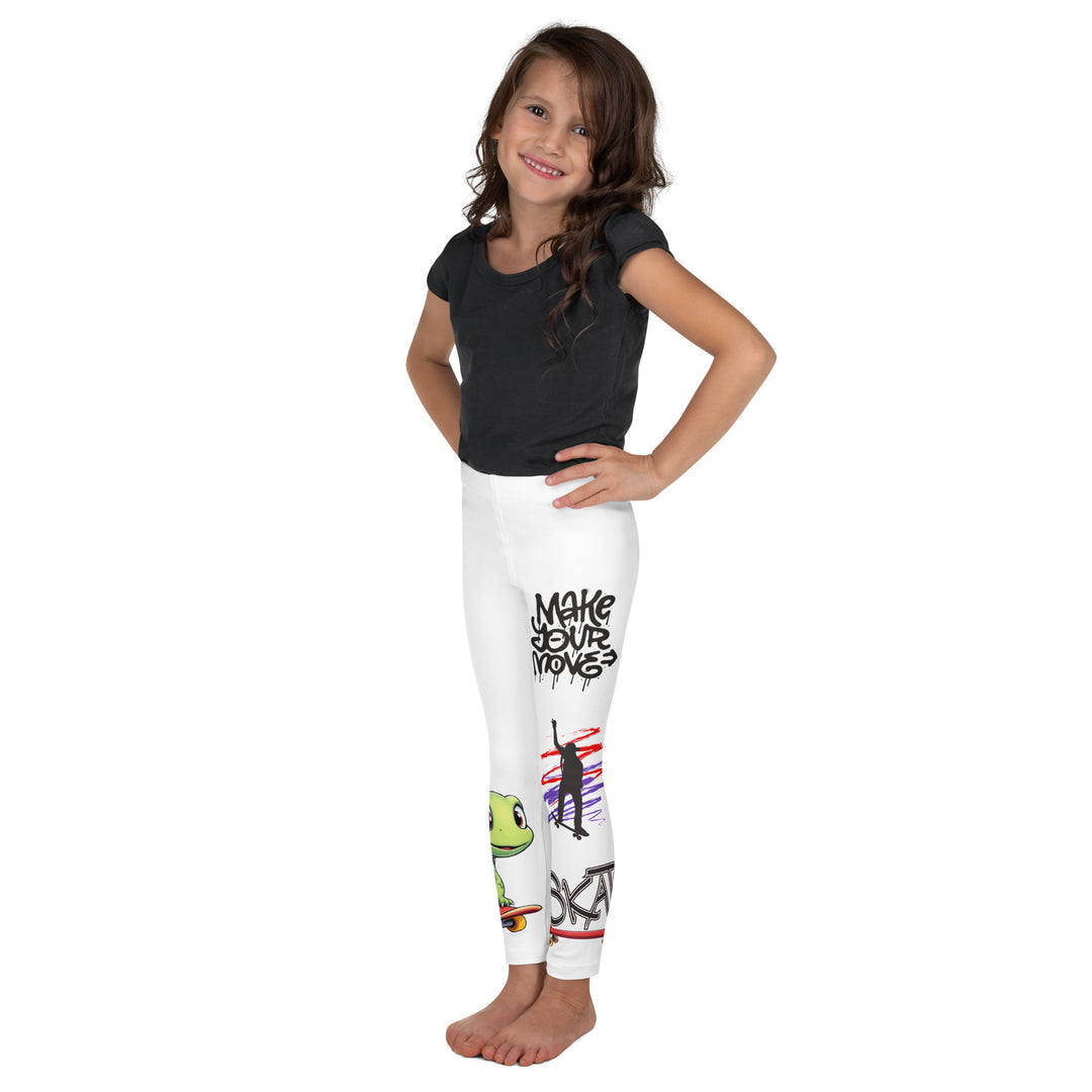Skater Turtle Girls Leggings, white background with a green turtle riding a skateboard on one leg, black "MAKE YOUR MOVE" text and black skater silhouette with pink and purple motion lines on the other leg, and a skateboard with "skate" text at the bottom of the leg, left side view on model