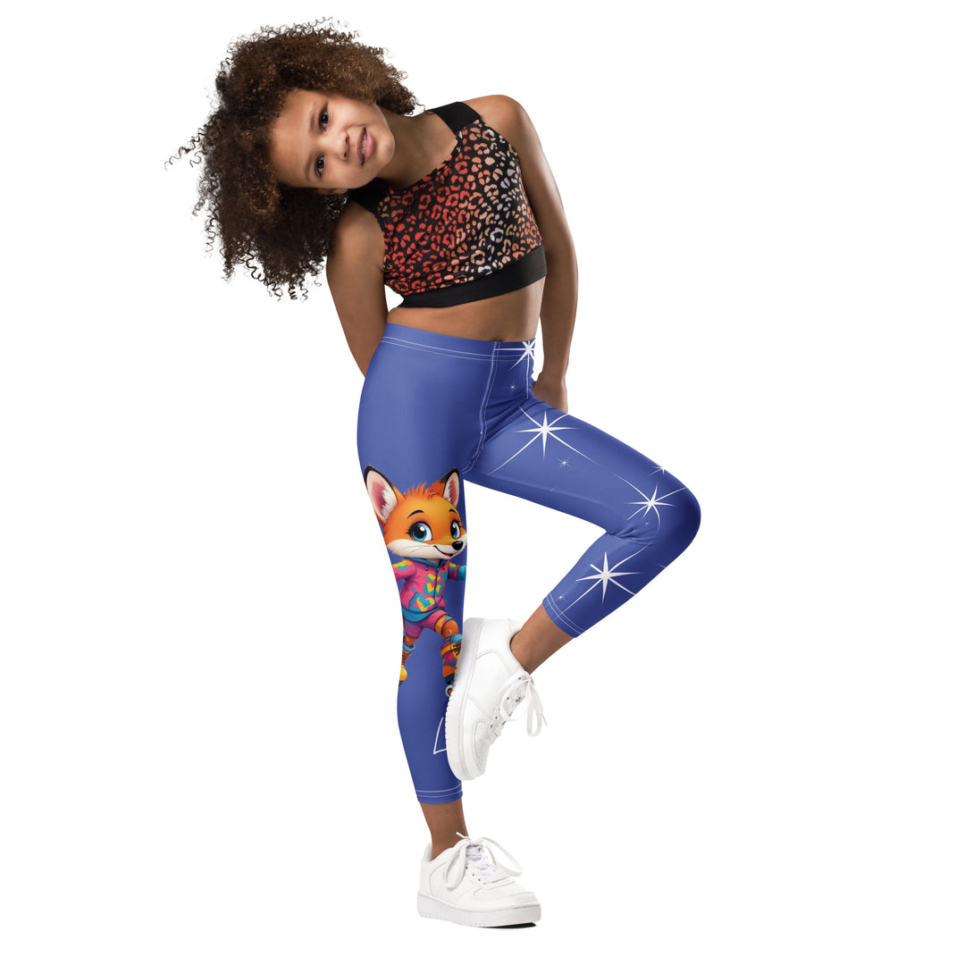  Starlight Fox Girls Leggings, dark blue background with a fox wearing blue, pink, and yellow sporty outfit on roller skates on one leg, and large sparkling white stars with small matching stars running down the other leg, side view with one leg lifted and bent on model
