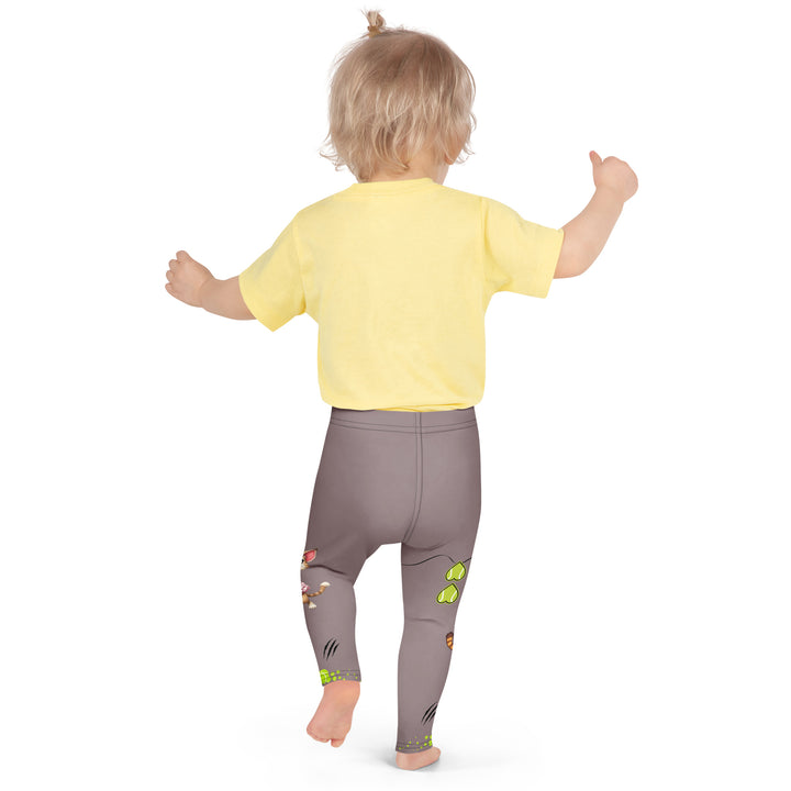 Tennis Kittens Girls Leggings, dark gray background with a cat holding a tennis racket on one leg and a kitten with a tennis racket on the other leg, each racket with a tennis ball as if playing, dressed in sporty outfits, with neon green tennis balls, hearts, and "love" text, back pose on model