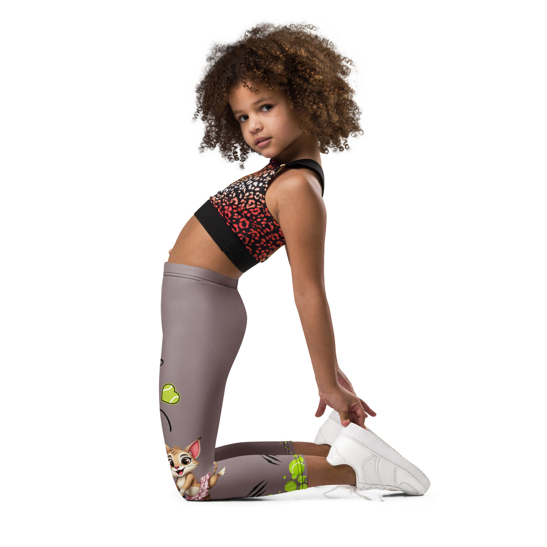 Tennis Kittens Girls Leggings, dark gray background with a cat holding a tennis racket on one leg and a kitten with a tennis racket on the other leg, each racket with a tennis ball as if playing, dressed in sporty outfits, with neon green tennis balls, hearts, and "love" text, left side view kneeling on model