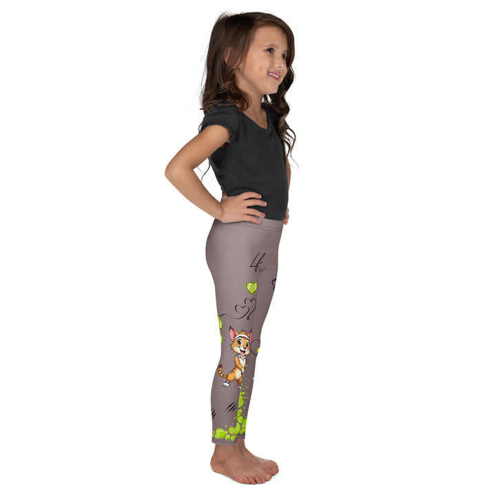  Tennis Kittens Girls Leggings, dark gray background with a cat holding a tennis racket on one leg and a kitten with a tennis racket on the other leg, each racket with a tennis ball as if playing, dressed in sporty outfits, with neon green tennis balls, hearts, and "love" text, right side view on model