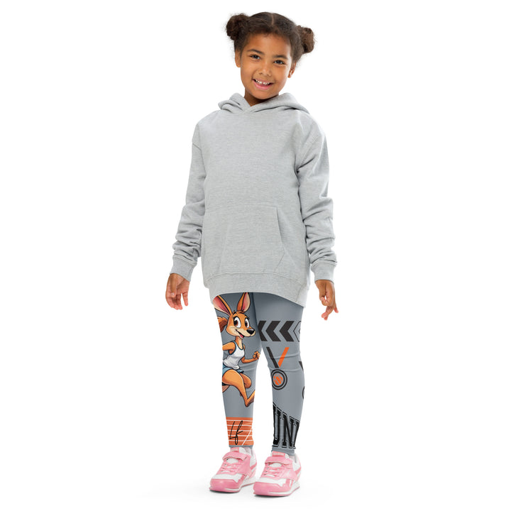 Track Runner Kangaroo Girls Leggings, dark gray background with a sporty kangaroo running on an orange track on one leg, "get ready" text in black and orange above, and an orange and black medal with "runner" text in the lower corner on the other leg, front pose with arms at sides on model