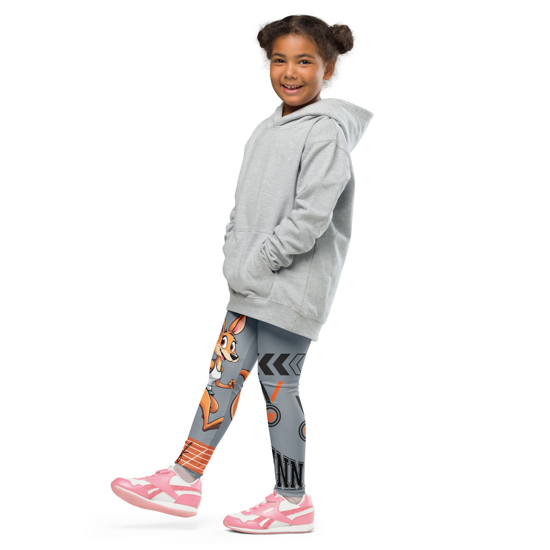 Track Runner Kangaroo Girls Leggings, dark gray background with a sporty kangaroo running on an orange track on one leg, "get ready" text in black and orange above, and an orange and black medal with "runner" text in the lower corner on the other leg, side view with one leg lifted and extended on model
