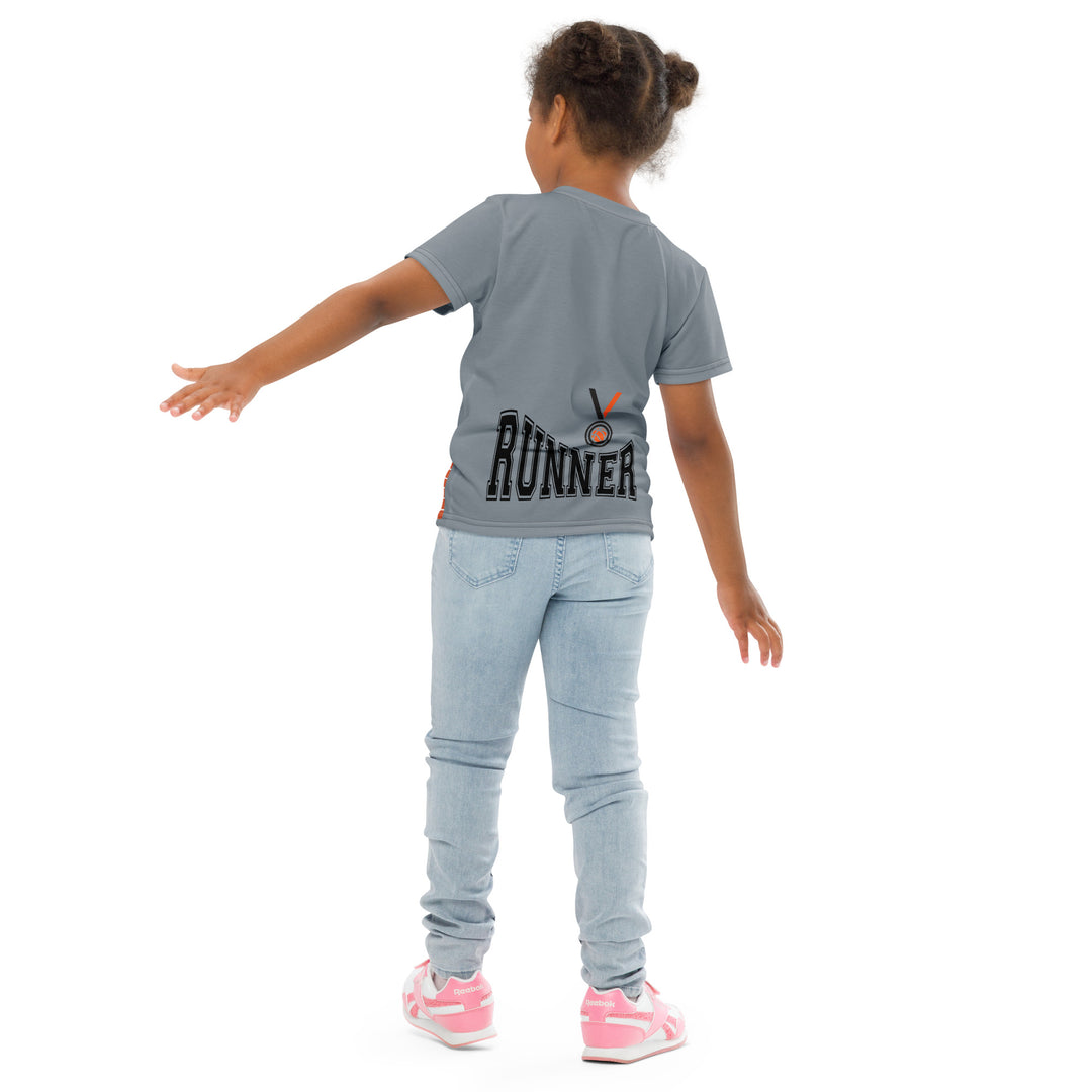 Track Runner Kangaroo Girls T-shirt, dark gray background with an orange sporty kangaroo running on an orange track on the front, and "RUNNER" text in black stitching with an orange and black medal at the bottom on the back, back angle with relaxed pose on model