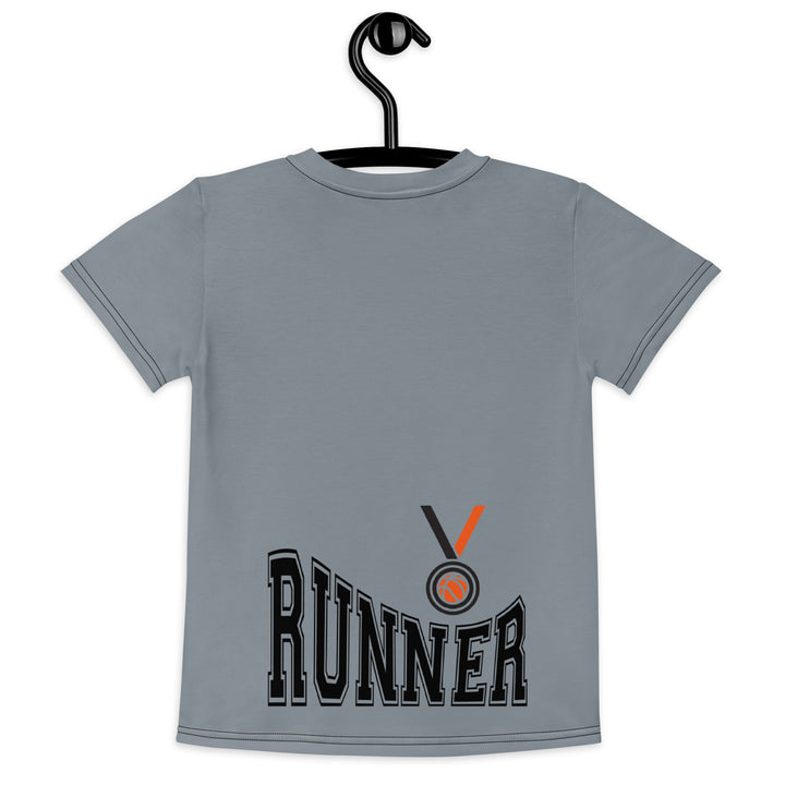 Track Runner Kangaroo Girls T-shirt, dark gray background with an orange sporty kangaroo running on an orange track on the front, and "RUNNER" text in black stitching with an orange and black medal at the bottom on the back, back view on hanger
