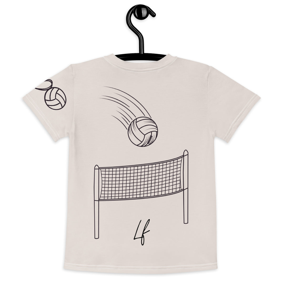 Volley Queen Tiger Girls T-shirt, beige background with a sporty dressed tiger holding a volleyball on the front, a heart, volleyball, and peace sign on the left sleeve, and a volleyball net with a ball leaving a motion trail on the back, back view on hanger