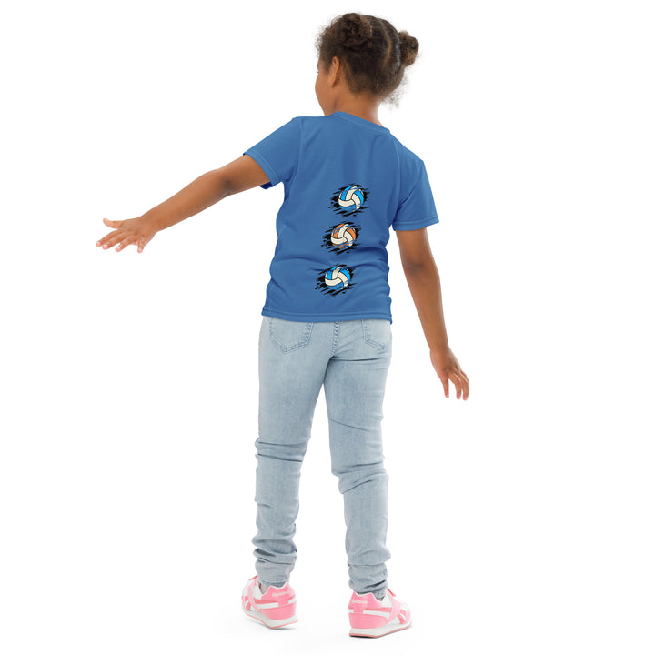 Volleyball Tiger Girls T-shirt, blue background with a sporty dressed tiger holding a volleyball on the front, and colorful glowing volleyballs on the back, back angle with relaxed pose on model