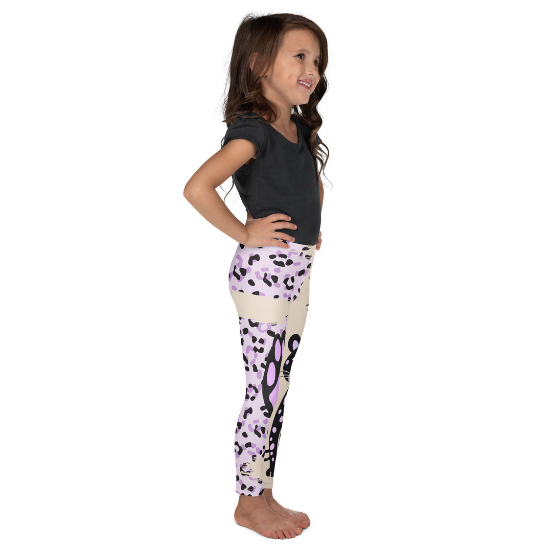 Wild Kitty Paw Purple Girls Leggings, cream background with a black panther featuring soft lavender spots on one leg, and a black and lavender tiger-striped pattern with a large matching paw on the other leg, mixed with cream details, right side view on model