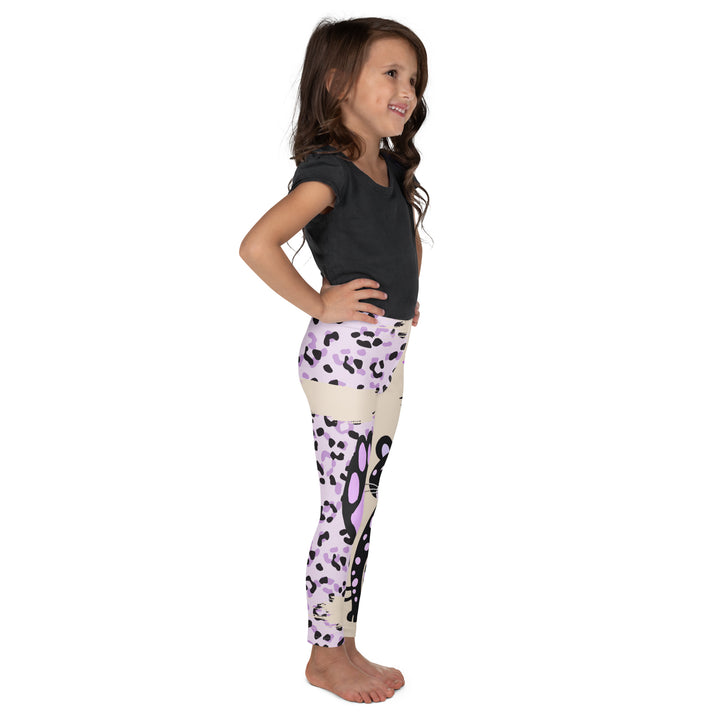 Wild Kitty Paw Purple Girls Leggings, cream background with a black panther featuring soft lavender spots on one leg, and a black and lavender tiger-striped pattern with a large matching paw on the other leg, mixed with cream details, right side view on model