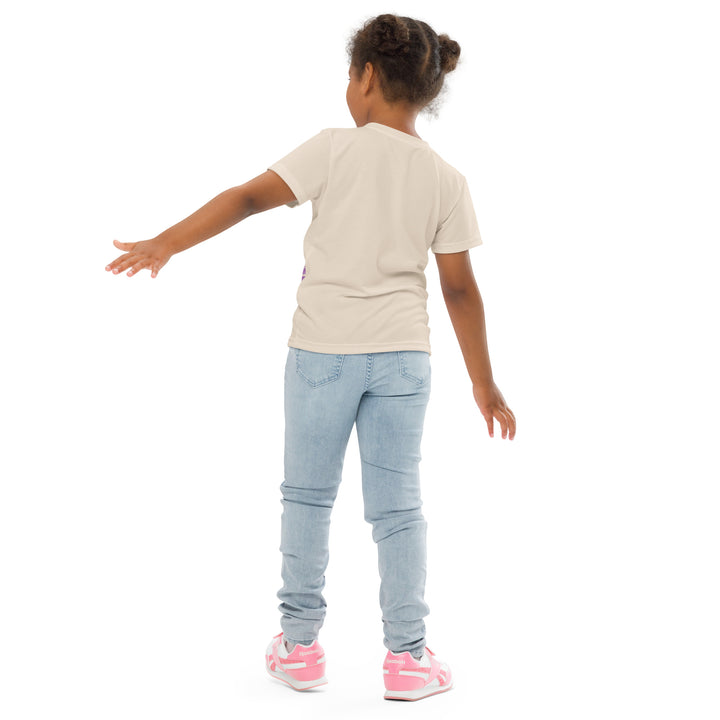 Wild Kitty Paw Purple Girls T-shirt, cream background with a black panther featuring soft lavender spots, accented by lavender brushstroke shapes and a cream tiger-print rectangular pattern, back angle with relaxed pose on model
