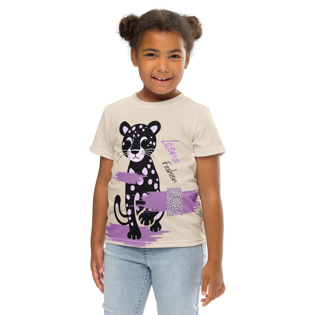 Wild Kitty Paw Purple Girls T-shirt, cream background with a black panther featuring soft lavender spots, accented by lavender brushstroke shapes and a cream tiger-print rectangular pattern, front pose with arms at sides on model-with a visible 'Leona Fashion' text on the design