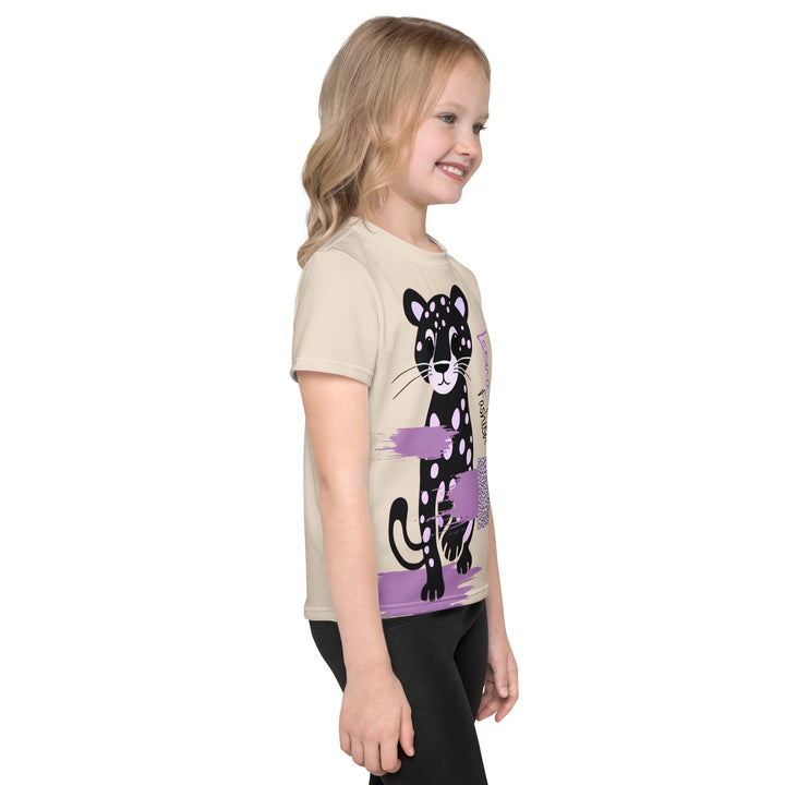  Wild Kitty Paw Purple Girls T-shirt, cream background with a black panther featuring soft lavender spots, accented by lavender brushstroke shapes and a cream tiger-print rectangular pattern, right side view on model-with a visible 'Leona Fashion' text on the design