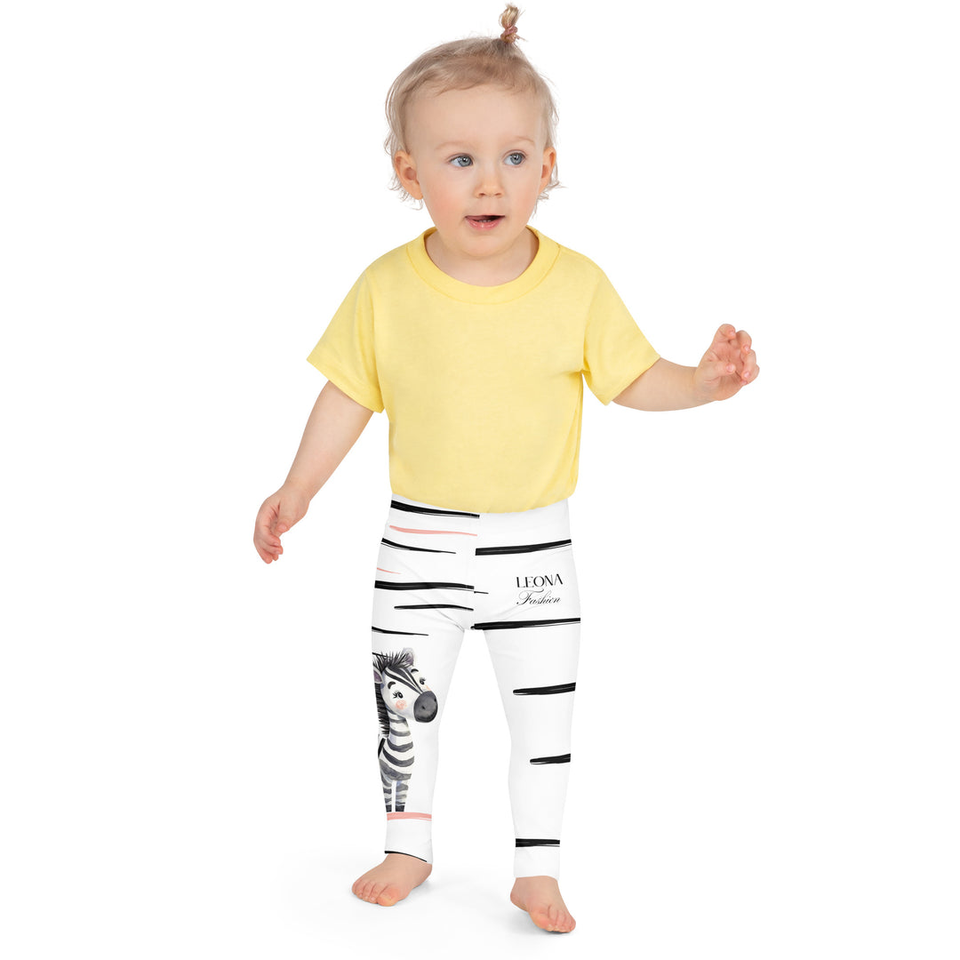 Zebra Blush Glow Girls Leggings, white with black and white zebra print and blush pink stripes-On-body front view-with a visible 'Leona Fashion' text on the design