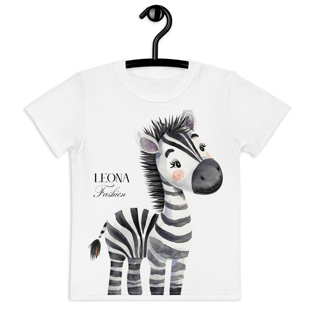 Zebra Blush Glow Girls T-shirt, white with black and white zebra print – front view on hanger-with a visible 'Leona Fashion' text on the design