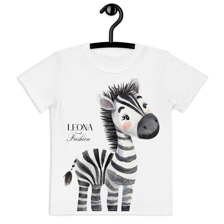 Zebra Blush Glow Girls T-shirt, white with black and white zebra print – front view on hanger-with a visible 'Leona Fashion' text on the design